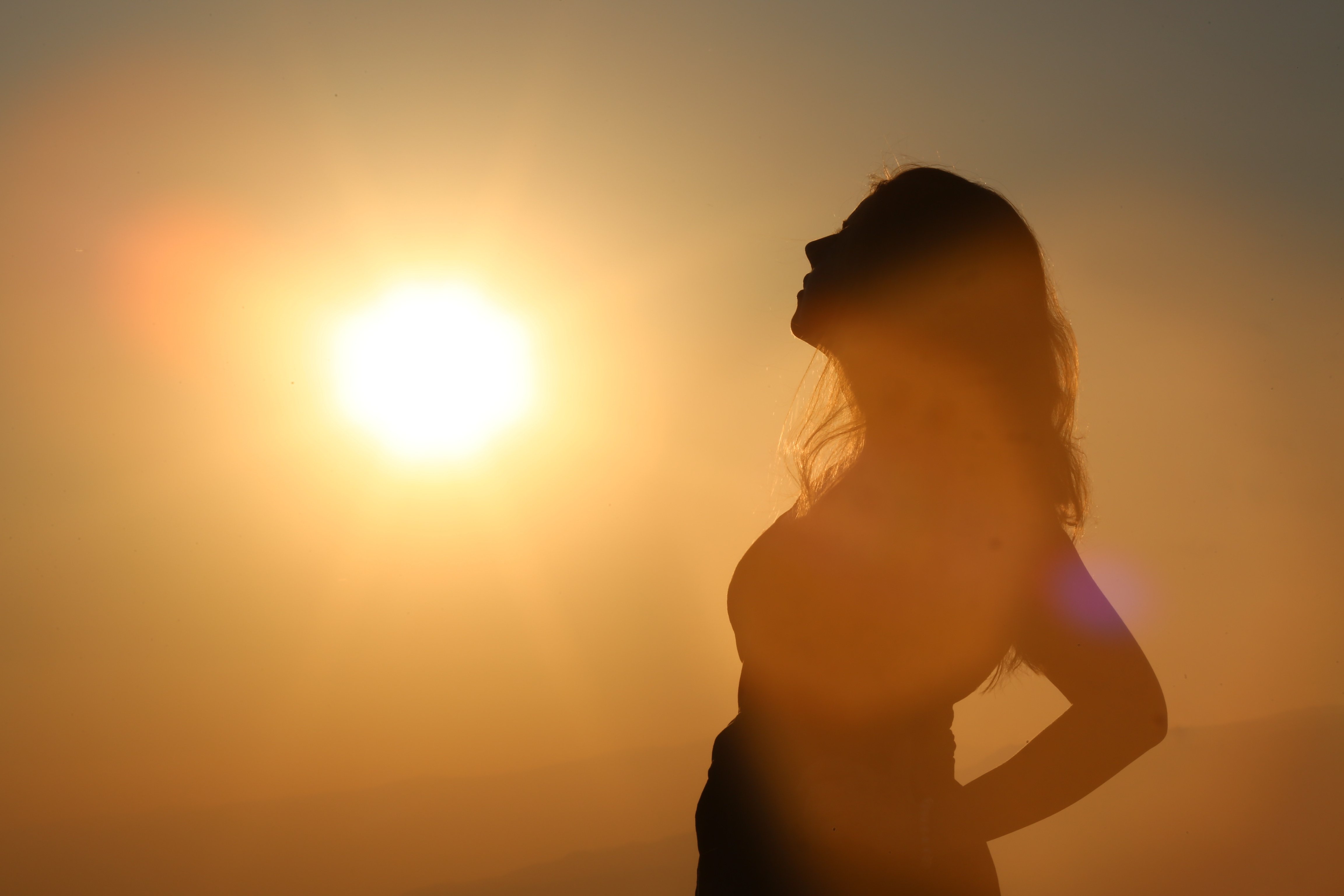 Silhouette of Woman at Dusk